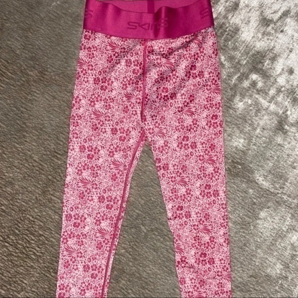 SKINS Pro Performance DNAmic Primary Compression Tights Floral gently preloved - Picture 2 of 14